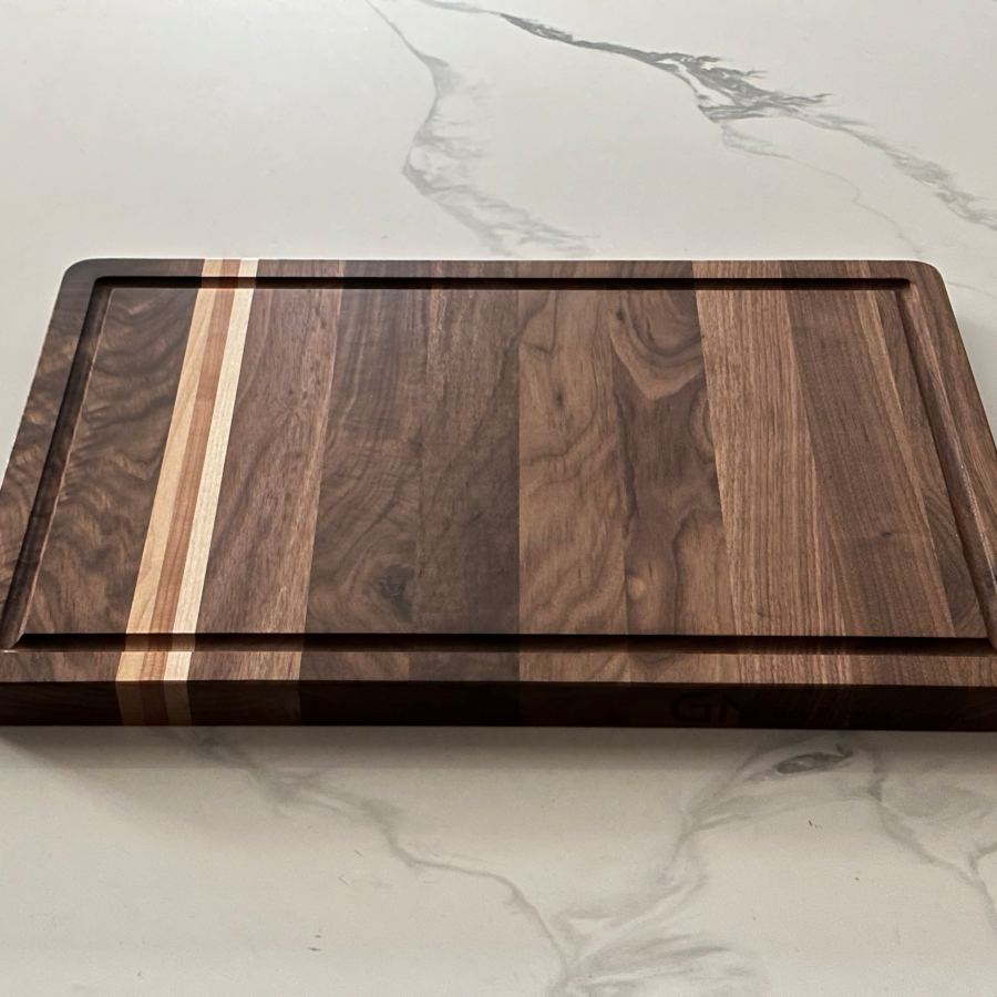 Walnut cutting board on marble